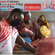 People wear face mask at a butcher Ouagadougou, Burkina Faso, April 20, 2020.